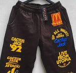 Load image into Gallery viewer, Travis Scott x McDonald&#39;s Sticker Bomb Sweatpants Brown
